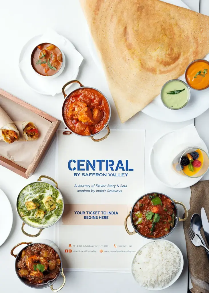 Indian dining spread with dosa, curries, rice, naan, and desserts at Central by Saffron Valley.